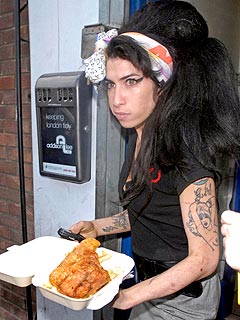 Winehouse Eats Alone for 1st Wedding Anniversary