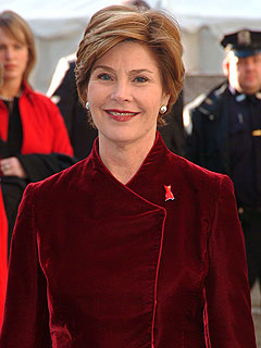 Obamas Get Praise from ... Laura Bush