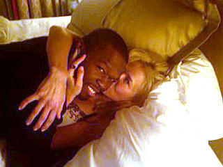 PHOTO: Chelsea Handler Hops in Bed with 50 Cent