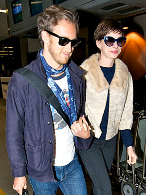 Anne Hathaway Returns from Honeymoon