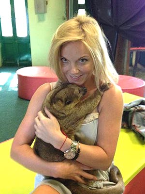 Russell Who? Geri Halliwell Cuddles Up to a Kinkajou