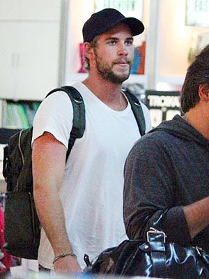 Liam Hemsworth Debuts New Beard While Miley Cyrus Tweets Engagement Ring Photo