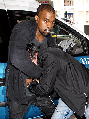 Kanye West Charged with Battery in Paparazzi Scuffle