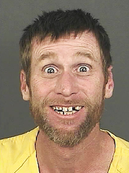 Michael Whitington Smiles Broadly for Mug Shot