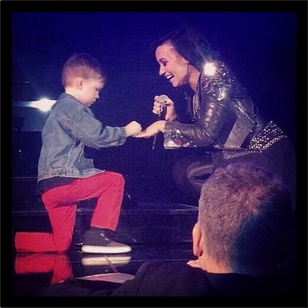 Demi Lovato 'Engaged,' Receives Proposal from Young Boy Onstage at Concert