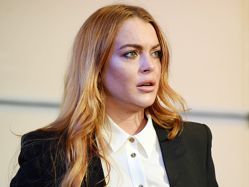 Lindsay Lohan Poses in Her Underwear and Jokes About Untreatable Illness