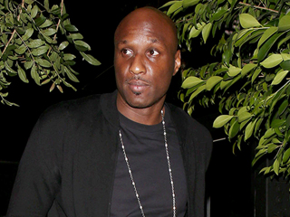 Lamar Spotted Partying at Strip Club amid Reports He Was Escorted from a Plane After Vomiting on Board