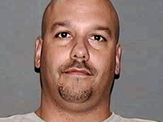 Former Cop Loses Both Legs After Allegedly Stabbing Ex-Girlfriend to Death Then Jumping in Front of N.Y.C. Train