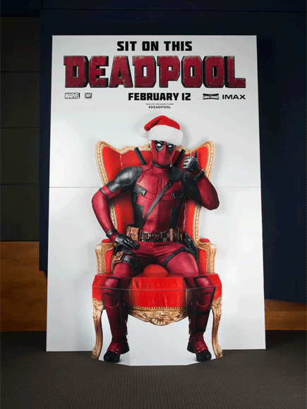 Ryan Reynolds Poses with Deadpool Cardboard Cutout