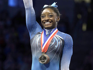Why Simone Biles Is the Michael Jordan of Gymnastics – And How She's Still a Typical Teen