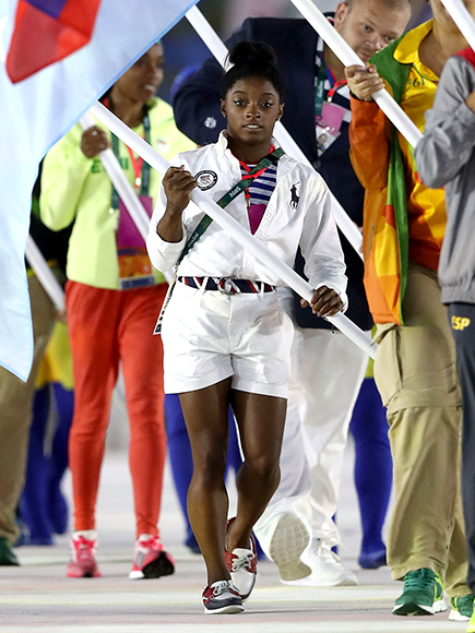 America's Golden Girl Simone Biles Leads Team U.S.A. During the Very Rainy Closing Ceremony in Rio