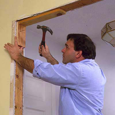 Cut four short 1x4s to serve as nailing blocks for the new drywall patch