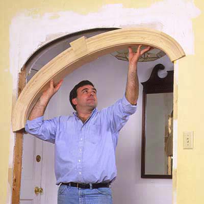 Start the final installation by first lifting the elliptical archway into place