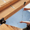 Mount cable holders to enable pulley system on slide down attic stairs