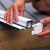 2. Snap the plastic end caps back onto the storage cassette after trimming it to size.