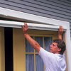 4. Snap the storage cassette into the mounting clips, then mark its position on the side jambs with a sharp pencil.