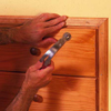 finish the knee-wall storage installation with attractive wood trim to  match dresser