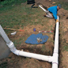 Run pipe from the T-fitting along the trench
