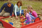 race car shaped sandbox for kids and adults to build