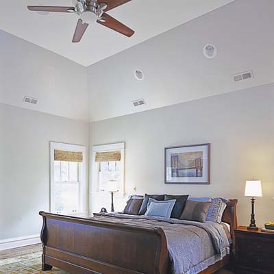 master bedroom with tray ceiling