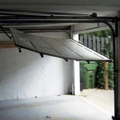garage door falling half-way to the floor of the garage
