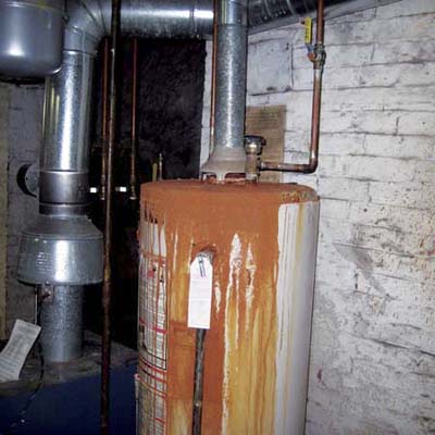 backed up residue from the chimney leaked over the entire water heater