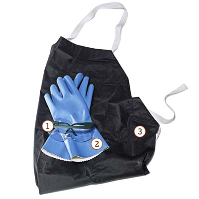 safety goggles and PVC-coated gloves on top of a black rubber apron