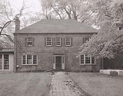 1930s brick house with nondescript entry
