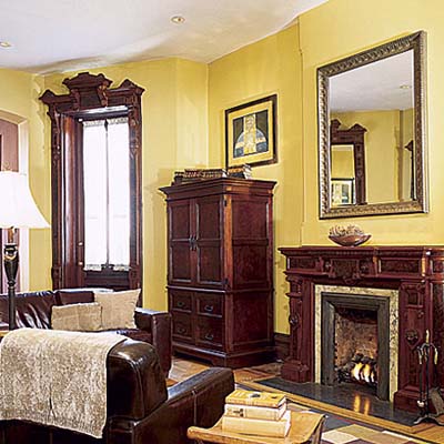 fireplace and golden-yellow walls