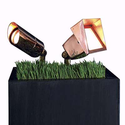 Hinkley's adjustable spotlight lamps allow you to focus the light on landscape features