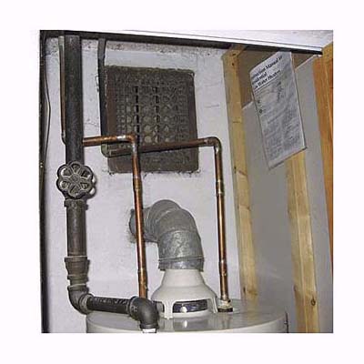 back-drafting fumes from a water heater are transported to the living space above