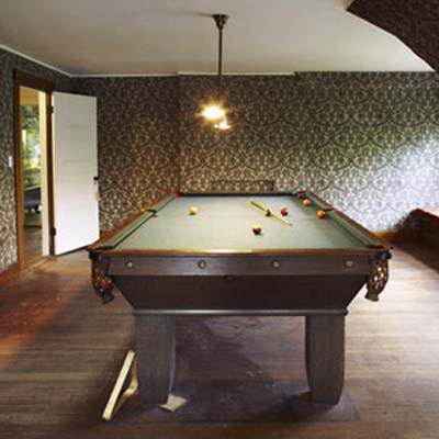Billiards table with light fixture