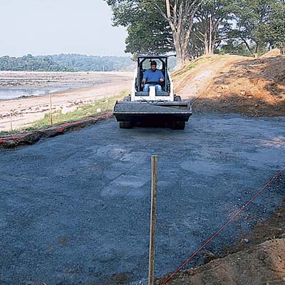Roger dumps in the gravel layer