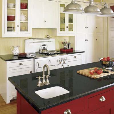 kitchen with Shaker-style cabinets, 1950s Chambers gas range, and granite countertops