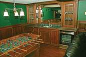 basement family room with pool table