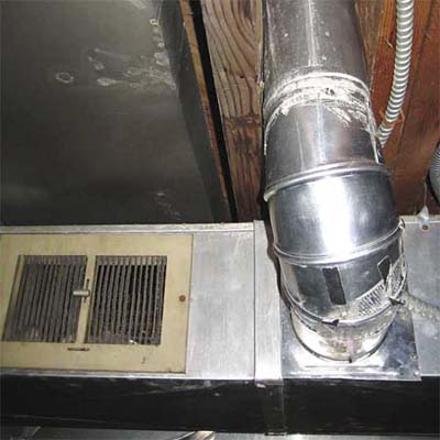 clothes dryer venting into the hot air supply duct