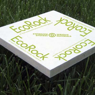 packaged EcoRock gypsum-free drywall sitting on top of blades of grass