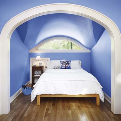 upstairs bedroom converted from attic space of cottage remodel in Austin, TX