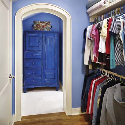walk-in closet converted from attic space of cottage remodel in Austin, TX