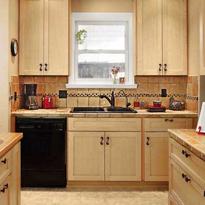 remodeled kitchen with new recessed lighting from a cottage remodel in Austin, TX