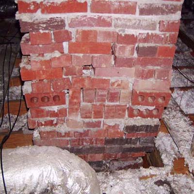 a chimney in an attic space with little or no mortar