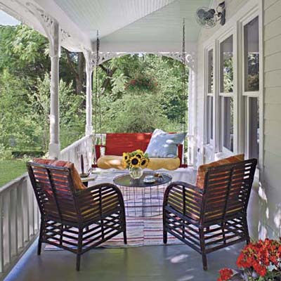 a porch in the farmhouse style