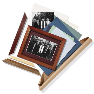 photo frame with family on top of paper and another family photo