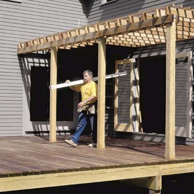 Tom Silva building the deck at the Billerica TV Project from 1999