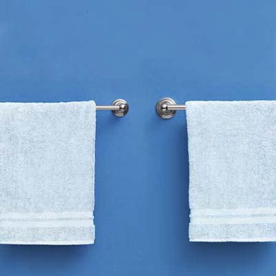 comparison of high end and moderately priced towel racks