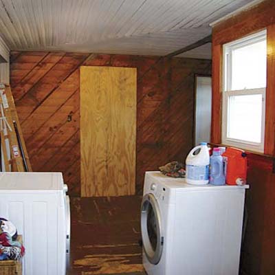 bungalow's laundry room before renovation into a bathroom