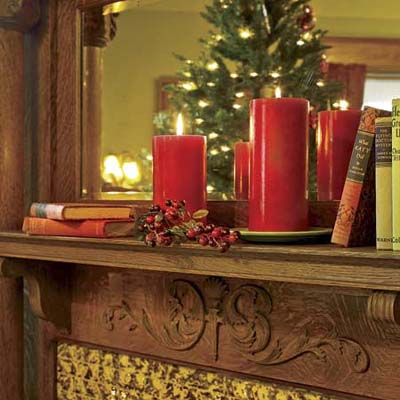 close up of ornate mantel decorated for the holidays