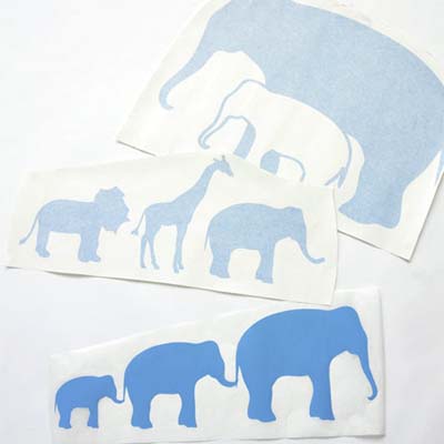 large wall stickers in the shapes of elephants and other circus animals