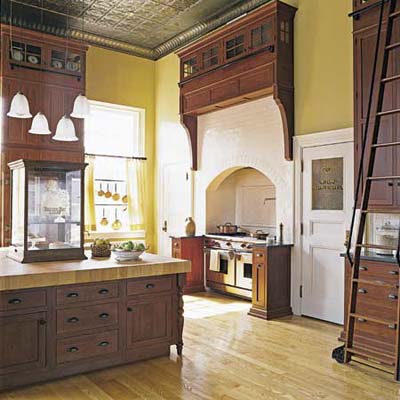 A post office turned into luxury home. This is a massive island in a 20x20 feet kitchen once a mail sorting area