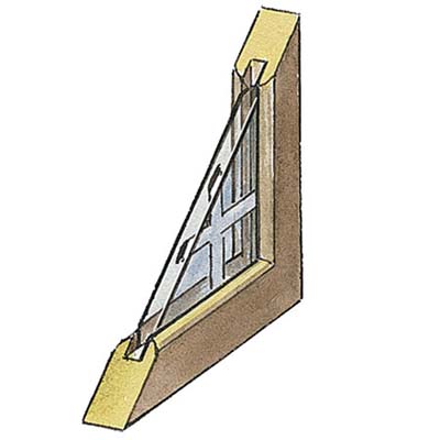 an aluminum grille installed between the two panes of this glass and wood windows